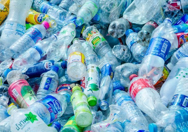 Single use plastic bottles in a pile